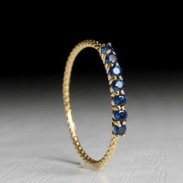 Band Rings Huitan Thin Band Blue Cubic Zircon Womens Ring Gold Unique Finger Accessories for Daily Wear Fashion Edition Jewelry Pendant Boat J240516