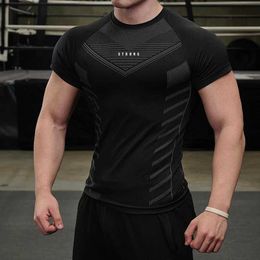 Men's T-Shirts New Mens Gym T-shirt High Elastic Fitness Quick Drying Short sleeved Sports Casual Top Running Q240515