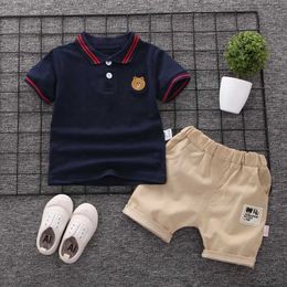 Clothing Sets Baby mens summer childrens clothing polo shirt set boy short sleeved childrens T-shirt childrens sports set 2 pieces cotton 1-5y WX