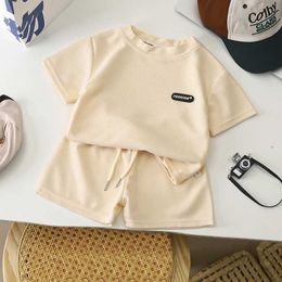 Clothing Sets 2PCS fashionable summer childrens and boys clothing set with solid Colour short sleeves and short sleeved thin cotton childrens T-shirt and shorts set WX