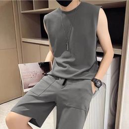 Mens summer 2024 solid Colour ice silk casual sportswear mens clothing with fashionable sleeveless short sleeved mens two-piece set 240507