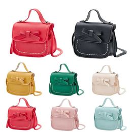 Backpacks Cute Girl Mini Bow Handbag Fashionable Childrens Coin Wallet Handbag PU Leather Cute Boys and Childrens Small Cross Shoulder Bag d240517