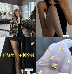 Zhou Xun039s 2020 New Flocking Belt Letter Liu Wen Small White Black Silk Stockings Fashion Jk9389990