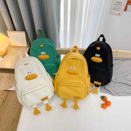 Backpacks Kindergarten backpack cartoon cute duckling reduces backpack burden for boys and girls campus canvas backpack d240516
