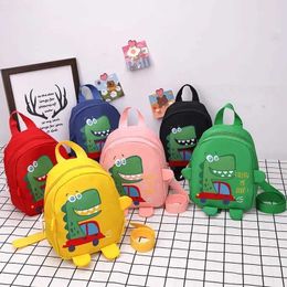 Backpacks Cute childrens cartoon mini dinosaur anti loss backpack kindergarten boys and girls school bag childrens school bag d240516
