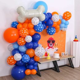 Party Balloons 113 piece dog themed balloon set suitable for birthday parties decorated with blue and orange themed bone dog cls