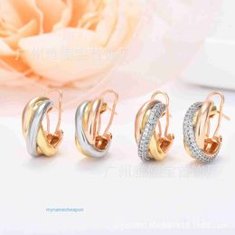 Luxury gold Carttrrie earrings V Gold Colored Three Ring Wrapped Earrings CNC Steel Seal Diamond Advanced Earnail Earclasp