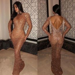 2020 Luxury Arabic Mermaid Long Prom Dresses Gold High Neck Long Sleeves Tassel Back Dubai Evening Party Gowns Vestidos BC0840 286r