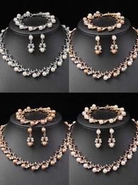 Wedding Jewelry Sets 4 pieces of womens jewelry set equipped with pearl rhinestone necklaces earrings bracelets brides wedding accessories