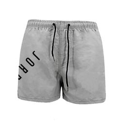 Korea Beach Shorts Men Trunk Summer Short Pants Solid Breathable Quick Dry Swim Shorts Surfing Unisex shorts Plus Size Shorts 240517