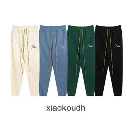 Rhude High end designer trousers for EMBROIDERED LETTERS DRAWN LOOP PANTS Summer Fashion Casual Couple Pants With 1:1 original labels
