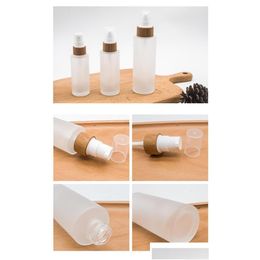 Storage Bottles Jars Cosmetic Body Lotion Glass Bottle Bamboo Pump Cap Essential Oil Frosted Cream Skin Care 4Oz Drop Delivery Home Ga Dhb9P