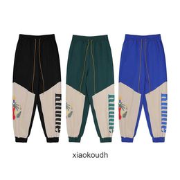 Rhude High end designer trousers for Fashion Coconut Tree and Pigeon Print Hip Hop Work Wear Casual Pants With 1:1 original labels
