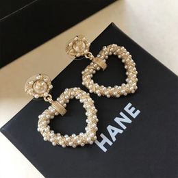 Small fragrance exaggerated love Pearl Earrings female S925 silver needle Korean socialite temperament online celebrity retro earrings