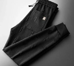 Man Cotton Tracksuits Designer Pant neue Luxushose Einfache trendige Krawatten Füße Slim Fit Sport Guard Marke Hosen für Männer Sport Sport