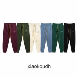 Rhude High End Designer 24s Modaya Gizli Slogan Drawstring Erkekler ve Kadınlar İçin Günlük Spor Pantolonları için Pantolon 1: 1 Orijinal Etiketlerle