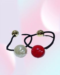 Fashion 2 color pearl hair ring rubber bands head rope popular headwear jewelry in European and American countries3280927