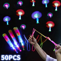 Other Toys New 50/30/10/5/1Pcs Amazing Light Toy Arrow Rocket Helicopter Flying Toy LED Light Toy Party Fun Gift Rubber Belt Launcher s5178