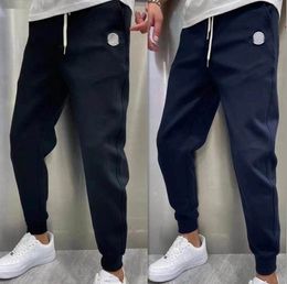 Pantaloni da uomo di abbigliamento da uomo Nuovi pantaloni da design di badge con padelle sciolte pantaloni da basket sport casual nove punti per uomo donna