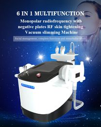 Portable 6 in 1 multifunctional monopolar RF negative plates RF skin tightening vacuum slimming machine face management 40KHz cavitation VELA