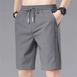 2024 Summer MenS Sports Shorts Solid Colour Straight Pattern Loose Type Elastic Waist Drawstring Casual Jogging Pants 240515