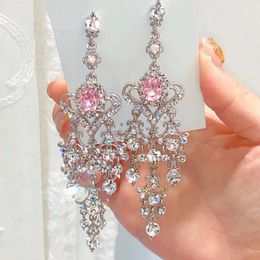 Dangle Chandelier MWsonya New Vintage Luxury Red Heart Crystal Pendant Earrings Suitable for Womens Elegant Rhinestone Tassel Party Jewelry d240516