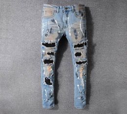 Famous Brand Mens Designer Jeans Slim Fit Mens Skinny Jeans Men Women Motorcycle Biker Hip Hop Distressed Ripped Jeans Pants8514453