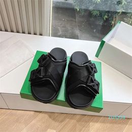 2024 Summer Versatile Cloth Crossed Buckle Pine Cake Bottom Sandals with Anti slip and Shit Stepping Feeling One word Women's Slippers