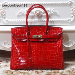 Bolsa de bolsa de grife de bolsa feita à mão 7A 2024 Crocodilo Padrão de couro feminino Ladiesbag tem logotipo