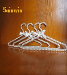 Sainwin 10pcslot 30cm20cm Children Pearl Baby Hangers For Kids Plastic Cloth Hanger Child Clothes Rack 2011114725575