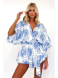 Fashionable printed and unique jumpsuit for summer womens V-neck leisure beach vacation high waisted tight fitting clothes 240509