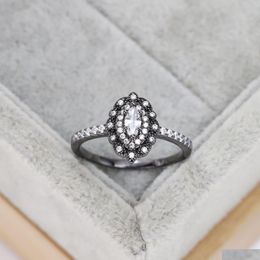 Anéis de banda 2023 S925 Sier banhado anel preto anel luxuoso conjunto oval de diamante com europeu e americano Drop Drop Drop Delive Dhdc2