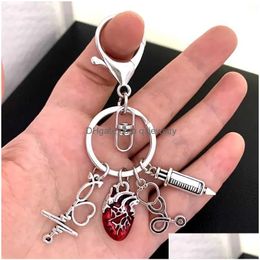 Keychains & Lanyards Oil Drip Heart-Shaped Pendant Keychain Medical Anatomy Doctor And Nurse Bag Chain Jewellery Gift Drop Delivery Fas Dhgot