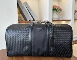 High-end Soft Leather Large Capacity Woven Travel Bag Men's Shoulder Handbag Short Business Trip Luggage Bags