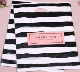 Fashion Whole 50pcslot 35x45cm Sachet Plastic Zakjes For Clothing with StHe Thank You Gift Packaging Bags3162551