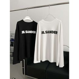 Kvinnors hoodies tröjor jil nytt kaos brev tryckning dekorativ design mode mångsidig rund hals långärmad t-shirt