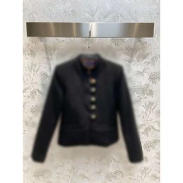 Blazer da donna blazer all'inizio dell'autunno in piedi collare a fila singola oro a bottone corto set di moda a mezza gonna alta