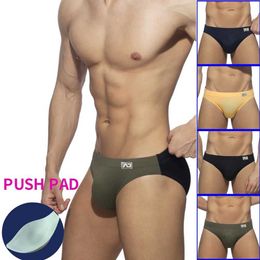 Men's Swimwear 23 New Mens Swimming Trunks Low-Waist Sexy Briefs Matching Colour Swimming Trunks Cup Anti-Embarrassing Beach Pants Quick-Drying Y240517