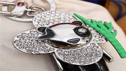 Luxury Designer Keychain Stylish Sunflower Doll Pendant Keychains Panda Keys Buckle Mens Womens Bag Key Ornaments High Quality8648597