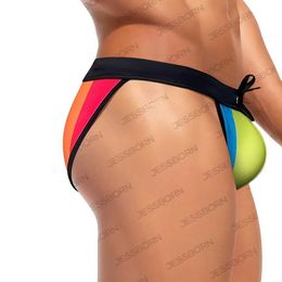 Men's Swimwear Sexy Side Hollow Out Mens Bikini Rainbow Swimwear Nylon High Fork Quick Dry Swim Briefs Male Pad Push Up Beach Surf Bathing Suit Y240517