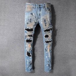 Famous Brand Mens Designer Jeans Slim Fit Mens Skinny Jeans Men Women Motorcycle Biker Hip Hop Distressed Ripped Jeans Pants3722732
