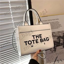 hot handbag womens designer bag the tote bag canvas Three line letters summer beach bags Straw shoulder bag Large capacity shopping 859