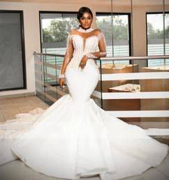 Luxury Mermaid African Wedding Dress 2024 High Neck Pearls Beaded Mesh Long Sleeves Aso Ebi Bride Gowns Corset Fish Bones Vestidos De Novia