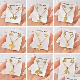 Earrings & Necklace Titanium Steel Jewelry Sets Fashion Gold Animal Cross Crown Moon Bear Dolphin Heart Key Design Pendant Necklaces Dhzpu