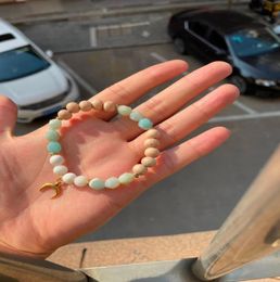 New MG1080 Strand Cutted Amazonite with white moonstone and small moon pendant in gold Bracelet8270250