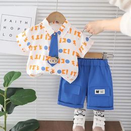 Clothing Sets Designer Baby Boys Clothes Set 2024 Summer Outfits For Kids Cartoon Print Letter Short Sleeve Shirt Shorts Toddler Tracksuits