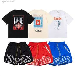 t Shirt Men Rhude Shorts Tracksuits Mens Designer Round Neck Printed Letters Rainbow Summer Fashion Cotton Short Sleeve