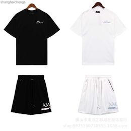Trend branded Amirirs costumes sets for men high quality designer clothes 2024 Trendy Brand Gradient Letter Trendy Brand Tshirt Shorts Set Mens and Womens Loose