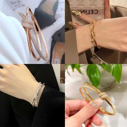 Fashion TFF high-end exquisite diamond studded horseshoe buckle with double knot rope fashion design Personalised butterfly knot rope wrapped bracelet for women