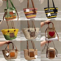 Totes 2024 Loe Fashion tote Basket Straw Bag Designer Hand Woven Cross Body Open Beach Handbag Ladies Summer bag high quality